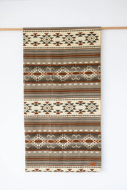 Tan and Brown Aztec Country Style Blanket hanging white background
