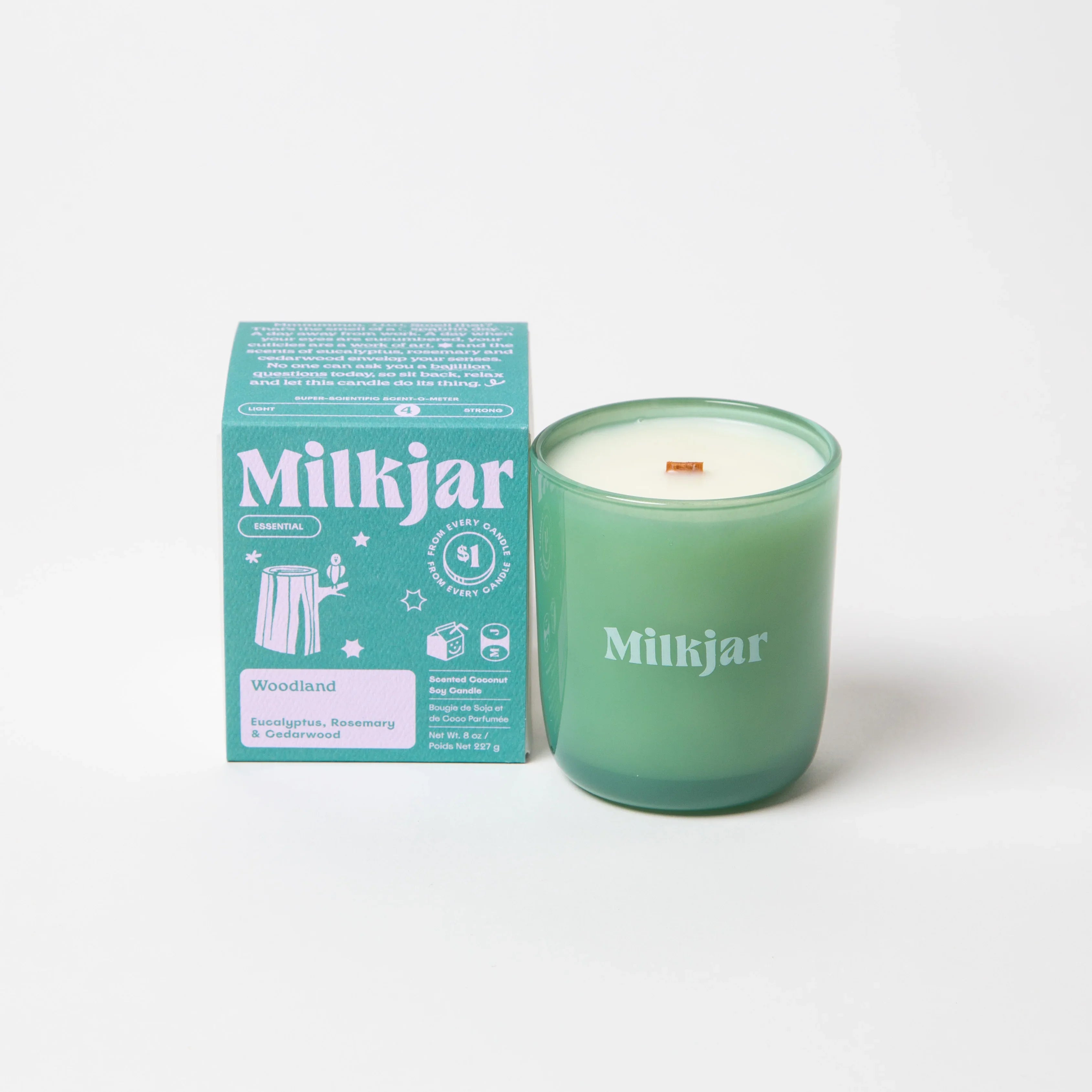 Green Milkjar Woodland candle and box with eucalyptus, rosemary, and cedarwood scent
